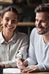 First home owner couple discussing property purchase